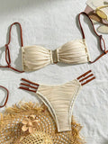 Biquini mediterrani de textura natural – sorra càlida